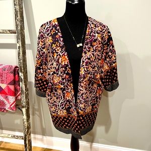 Beautiful cover/wrap by Liz Claiborne